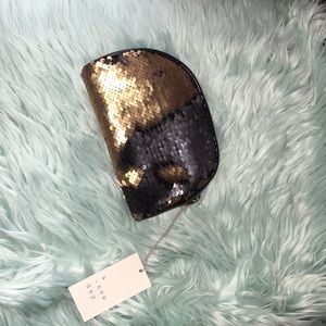 A new day two way sequin pouch clutch